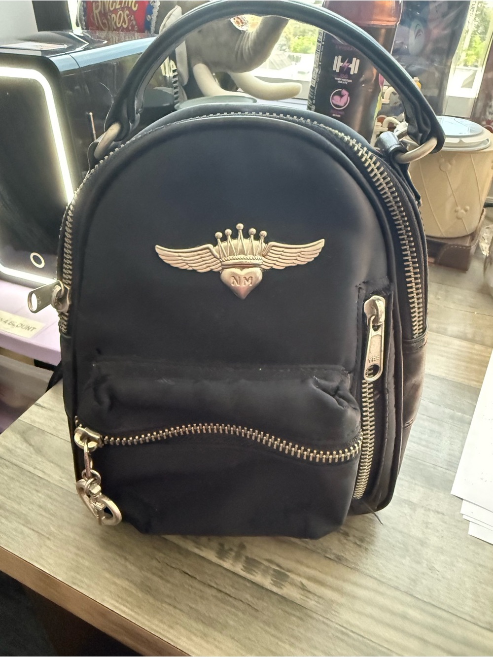 Nicole Miller Black Mini Backpack with Gold Accents